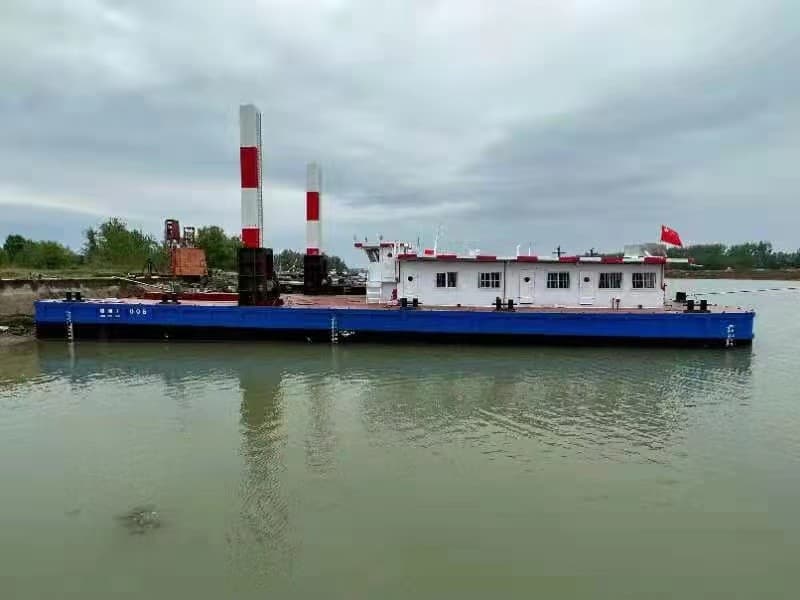 Plateforme de travail personnalisée pour pelle rétro et drague, destinée aux opérations d'excavation.